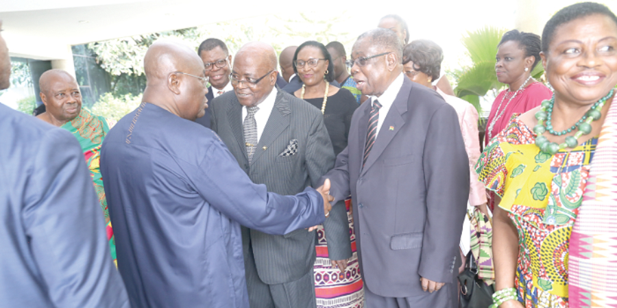 President Akofo-Addo  in a handshake with Ambassador Victor Gbeho